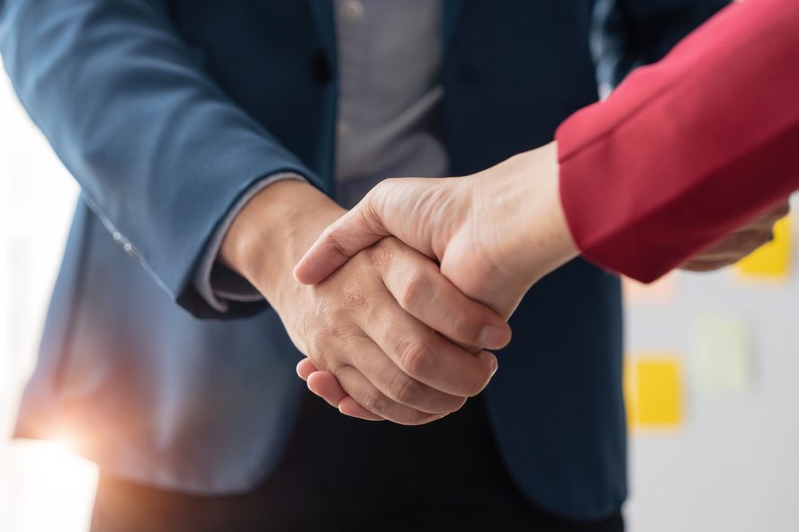 Two businessmen shaking hands