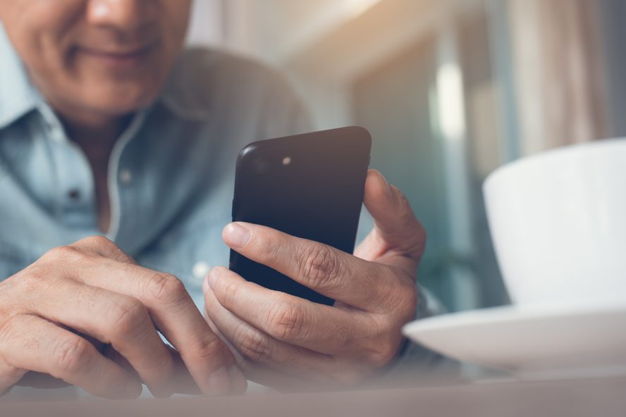 Smiling man on a video call on his smartphone